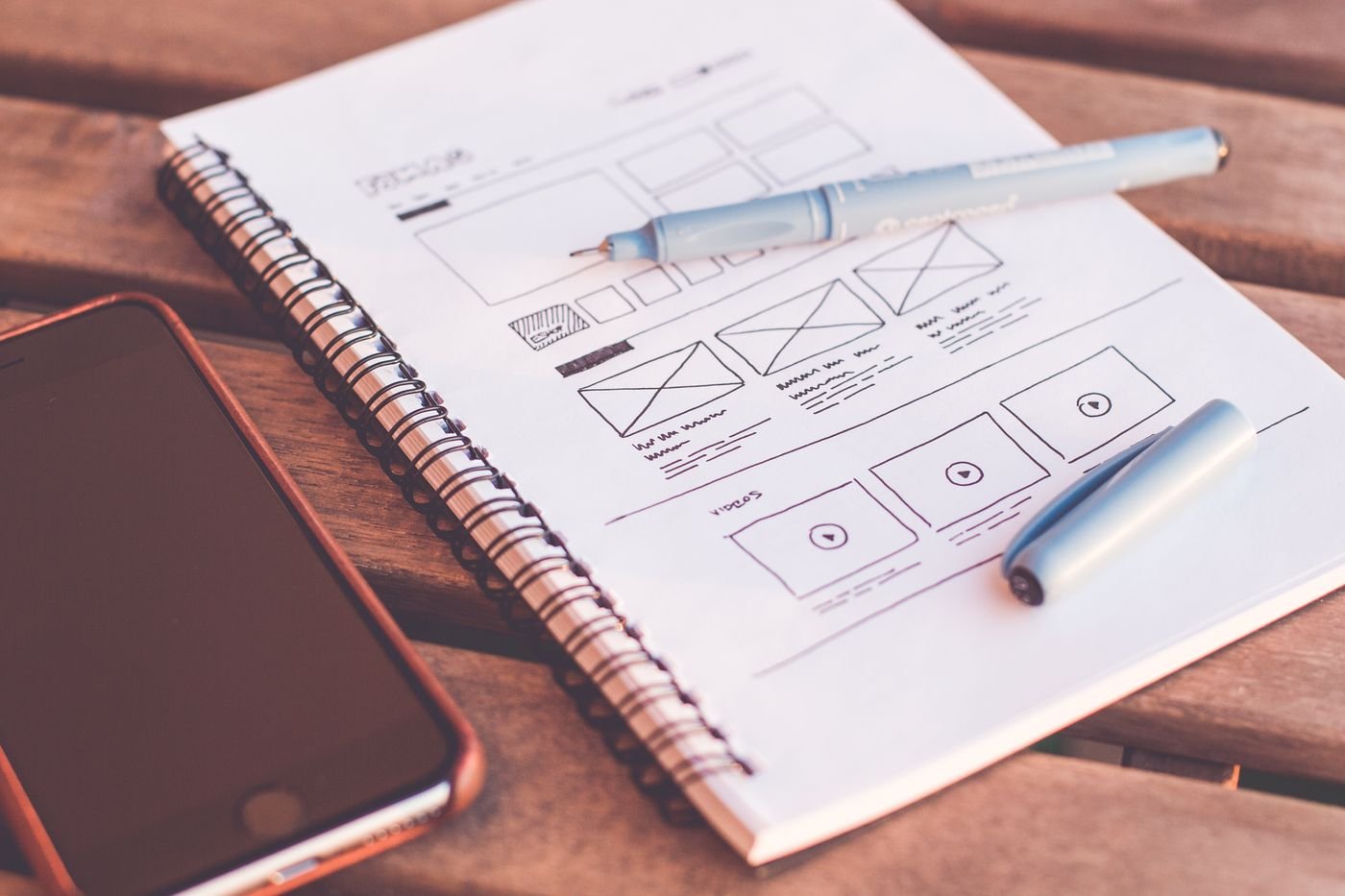 Interface wireframe planning — illustrative service photography